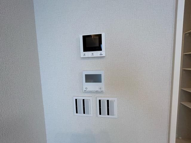 �y�Z�L�����e�B�z�@