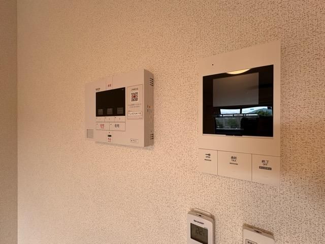 �y�Z�L�����e�B�z�@